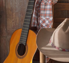 Cowboy hat and guitar.