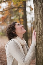 Woman looking at tree.