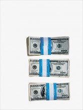 Piles of money. Photographer: David Arky