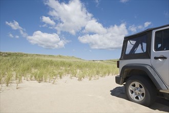 Jeep on the beach. Photographer: Chris Hackett