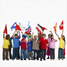 Children waving flags. Photographer: momentimages