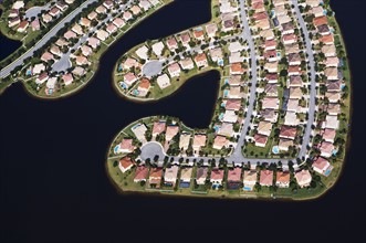 Aerial view of waterfront houses. Photographer: fotog