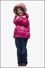 Young girl wearing winter clothing. Photographer: Mike Kemp