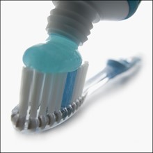 Toothbrush and toothpaste. Photographer: Mike Kemp