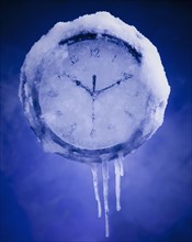 Clock covered in snow and ice. Photographer: Mike Kemp