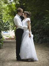 Bride and groom kissing. Photographer: Mike Kemp