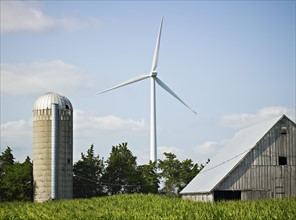 Wind turbine and old farm buildings