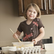 Girl baking. Photographer: Mike Kemp