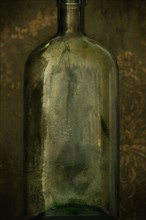 Antique glass bottle. Photographer: Joe Clark
