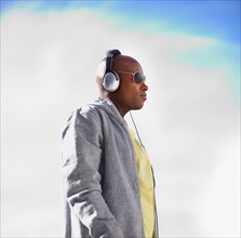 Man wearing headphones. Photographer: momentimages