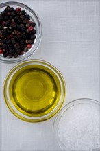 Peppercorns olive oil and sea salt. Photographer: David Engelhardt
