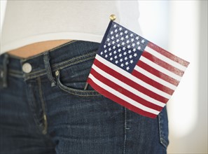 Woman with American flag in pocket.