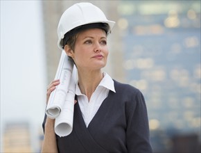 Female architect on construction site.
