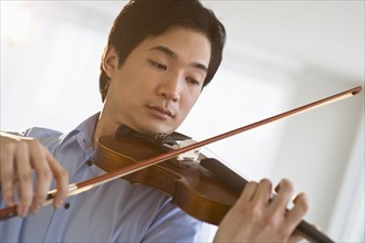 Man playing a violin.