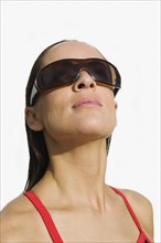 Woman wearing sunglasses.