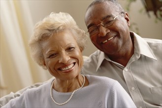 Portrait of a smiling elderly couple. Photographe : Rob Lewine