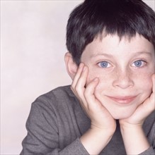 Portrait of a young boy. Photographe : Rob Lewine