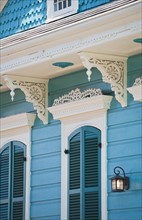 Exterior of blue house in New Orleans.