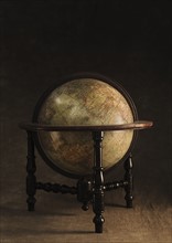 Antique globe and stand.