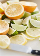 Freshly cut lemons limes and oranges. Photo : Jamie Grill