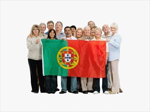 Group of people holding the Portuguese flag. Photo : momentimages