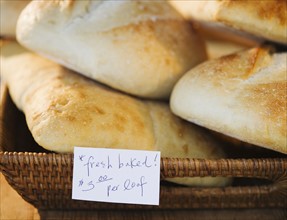 Basket of freshly baked bread in bakery. Photo : Jamie Grill