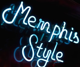 Illuminated Memphis Style sign on Beale Street in Memphis.