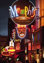 Illuminated bar signs on Beale Street in Memphis.