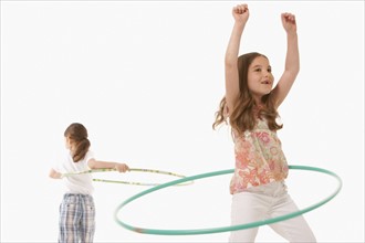 Children playing with hula hoops. Photo : K.Hatt
