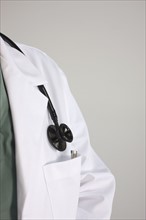 Stethoscope on Doctor's lab coat. Photo : Dan Bannister