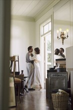 Couple dancing in their home. Photo : Rob Lewine