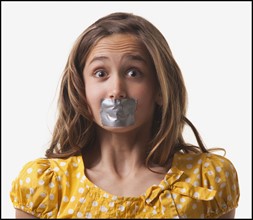 Teenage girl with duct tape on her mouth. Photo : Mike Kemp