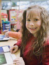 Kindergarten student in classroom.