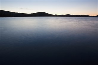 Lake at twilight. Photo : Chris Hackett