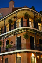 Balconies at night in French Quarter of New Orleans.