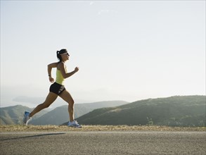 Runner training on the side of the road. Photo. Erik Isakson