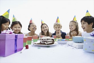 Group of children at a birthday party. Photo. momentimages