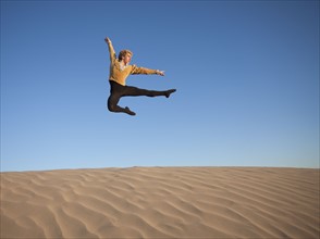 Ballet dancer in desert. Photo. Mike Kemp