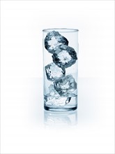 Ice cubes in glass. Photo. David Arky