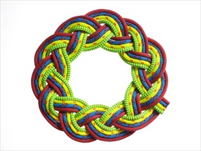 Colorful rope braided in a circle. Photo. David Arky