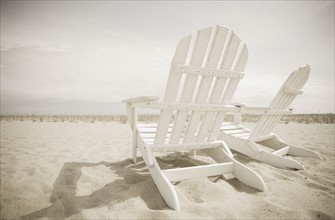 Adirondack chairs on the beach. Photo. Chris Hackett