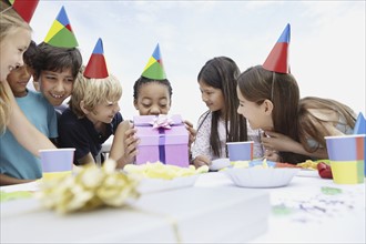 Children at a birthday celebration. Photo. momentimages