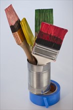 Paintbrushes in can. Photo : Daniel Grill
