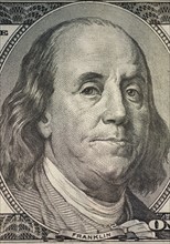 Benjamin Franklin on one hundred dollar bill.