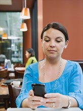 Woman texting.