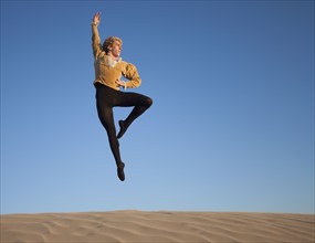 Ballet dancer in desert. Photo. Mike Kemp