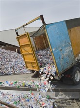 Recycle truck dumping out plastic bottles. Photo. Erik Isakson