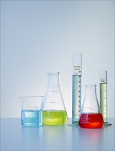 Beakers and flasks with colorful liquids.
