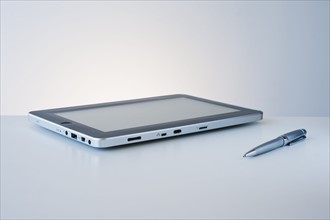Digital tablet and pen.