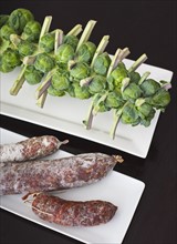 Sausage and brussel sprouts.